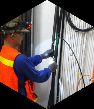 Technician installing fiber optic cable